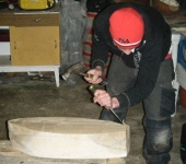 Cathal chiselling his hull.